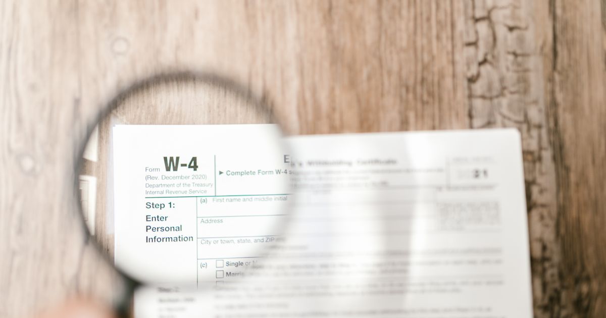 Compliance documents and forms spread out for review