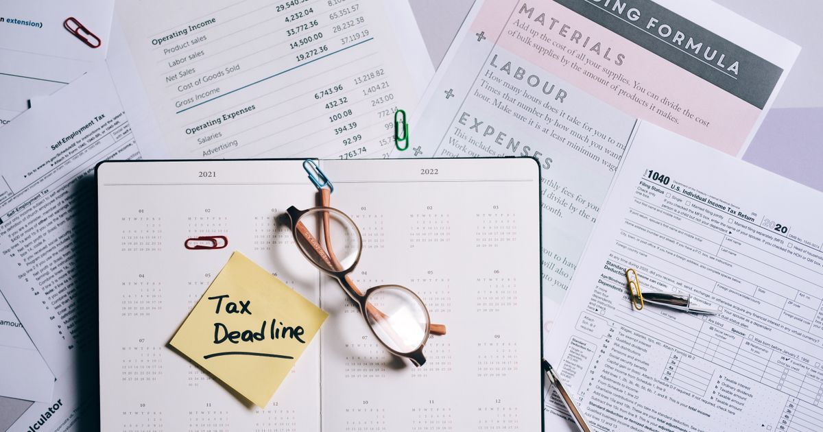 Financial year-end paperwork and planning on a desk